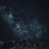 Starry sky with Milky Way over mountains